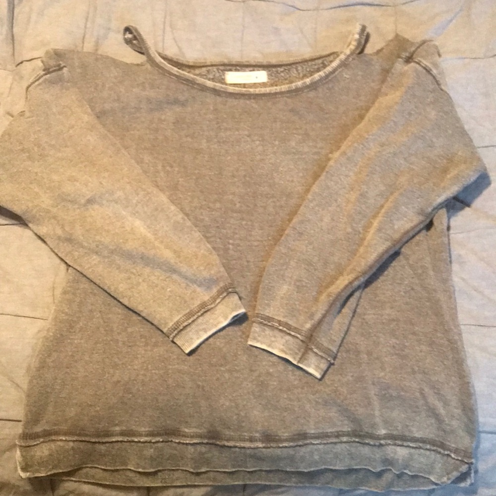 Oversized sweater with open neckline